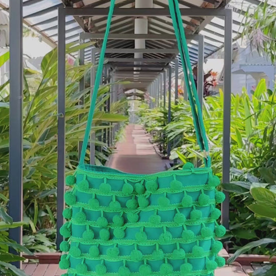 Ha Leh Pom Pom Shoulder Bag in Green video