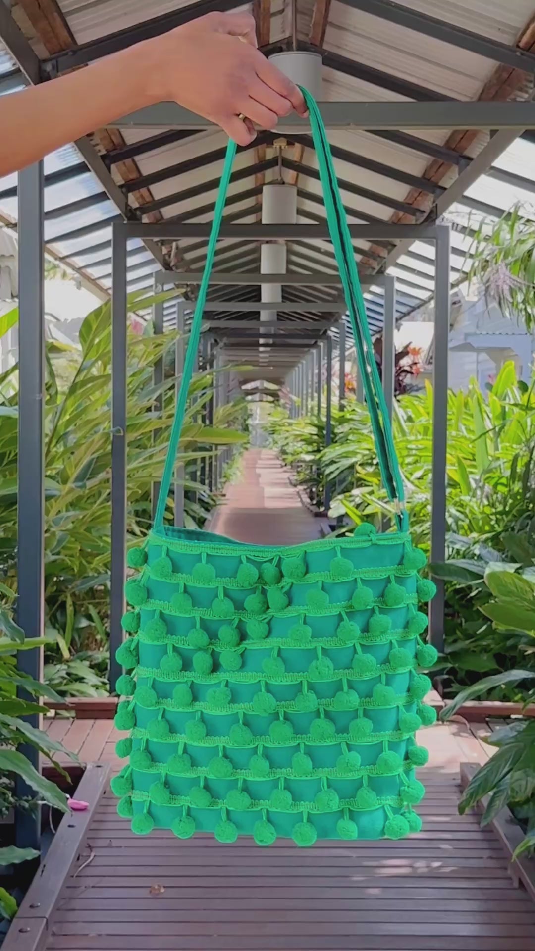 Ha Leh Pom Pom Shoulder Bag in Green video